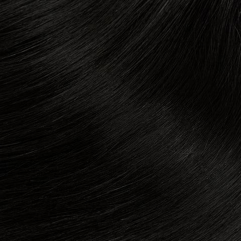 close up of black straight brazilian hair extensions