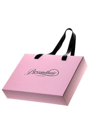 Pink Beyond Hair branded gift bag.