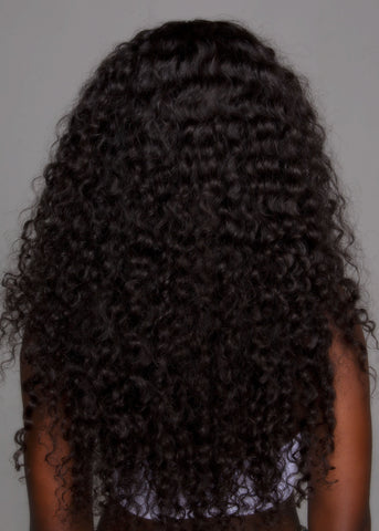 Model wearing Curly Peruvian Hair Extensions