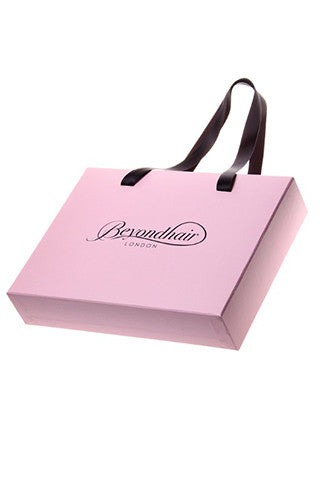 Pink Beyond Hair branded gift bag.