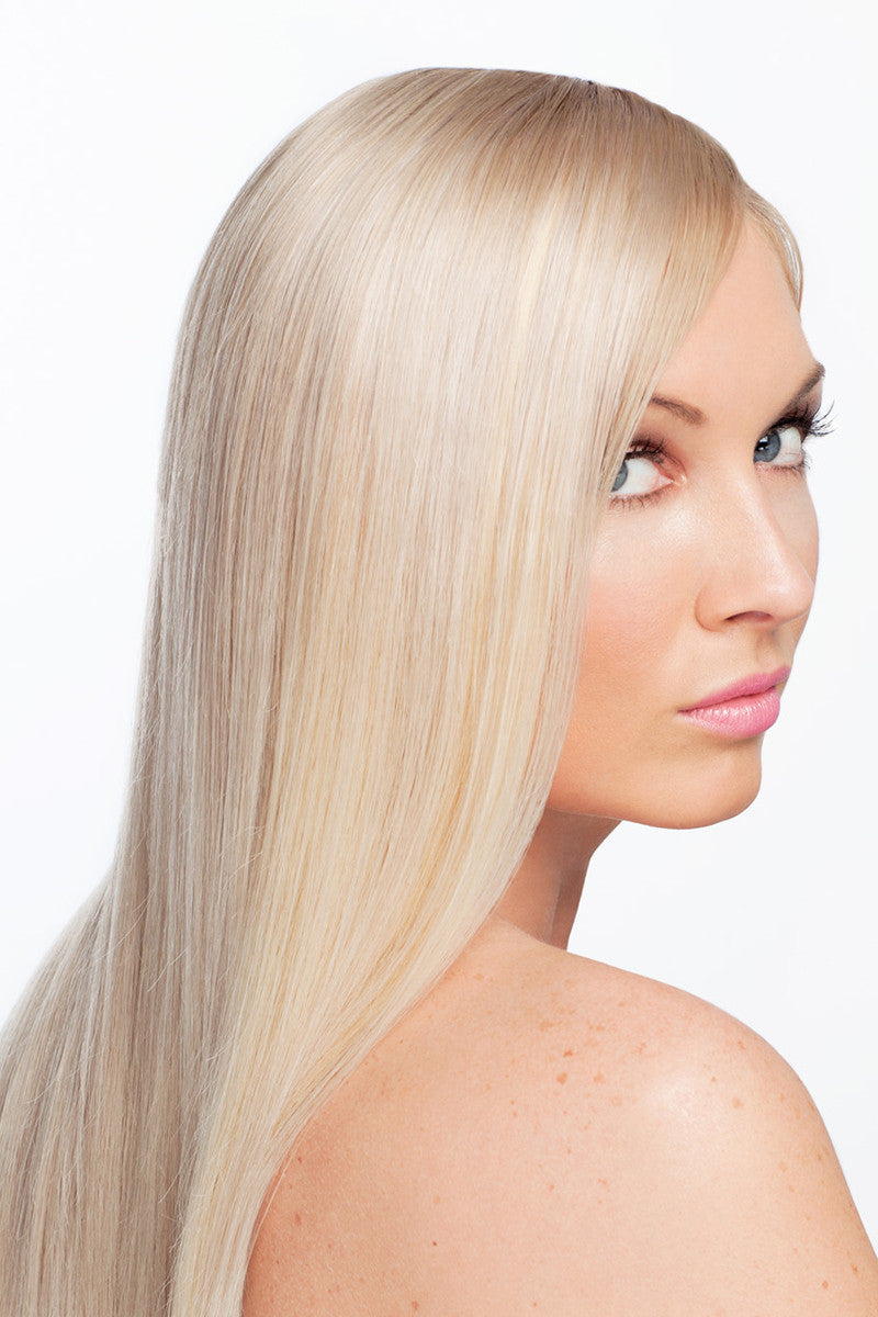 Model posing with pre dyed hair hair extensions rear view