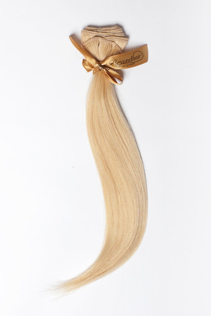 Weft of blonde pre dyed hair extensions